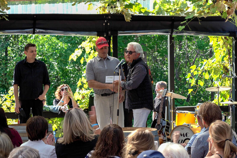 Owner Carl Sparkes presents a cheque for 10,000 to Mr. Mike McPhee, fundraising Chair for the Cape Breton Regional Health Foundation's “Cancer Care Here at Home” project.