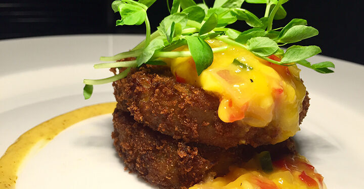 Crab Cakes with Old Bay seasoning, Curry Aioli and Mango Salsa
